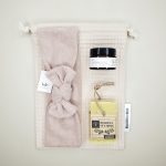 Pochette contenant masque gold evolve, savon à froid et bandeau maho